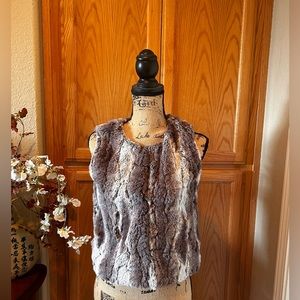 Gently used fur vest, size XL (girls).